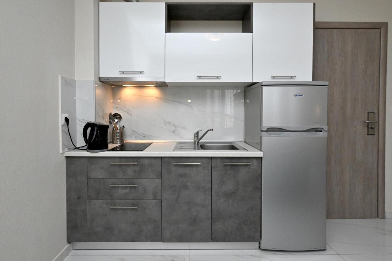 Sinodinos Deluxe Apartments Афитос Экстерьер фото